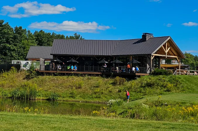 Picture of brewery back patio from field
